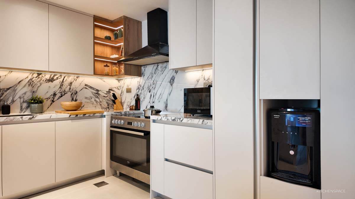 Open-Concept Marble Waterfall Kitchen